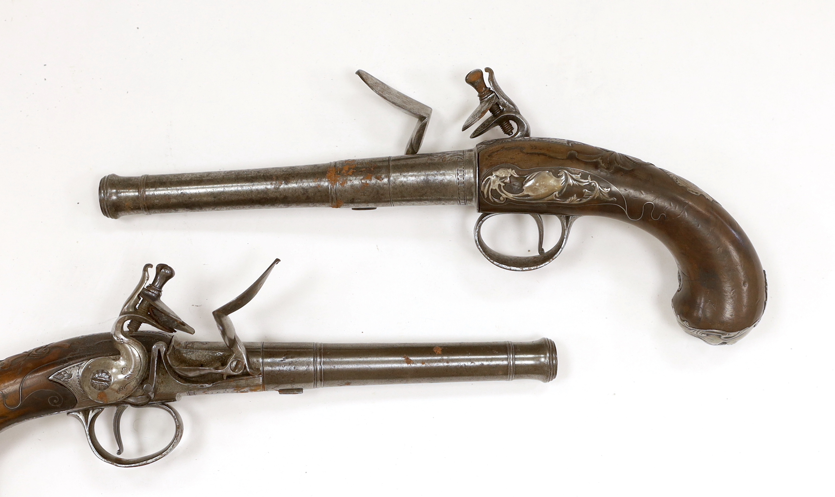 A pair of Queen Anne cannon barrel side hammer flintlock holster pistols by T. Richards, c.1770